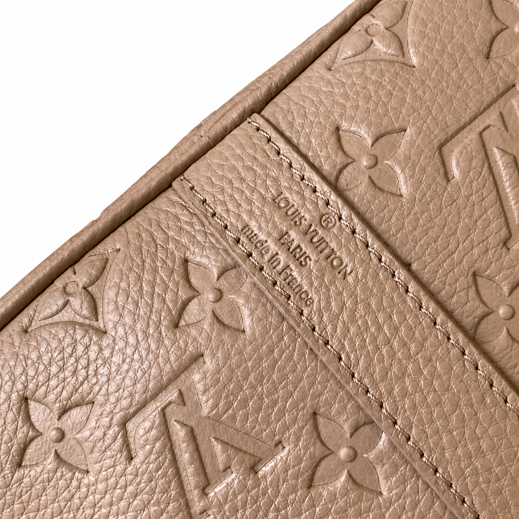 LV Keepall Bandoulière 35 Monogram Empreinte Leather Taupe Travel Bag