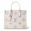 Louis Vuitton OnTheGo MM — Monogram Empreinte Leather in Crème with Lavender Trim & Interior