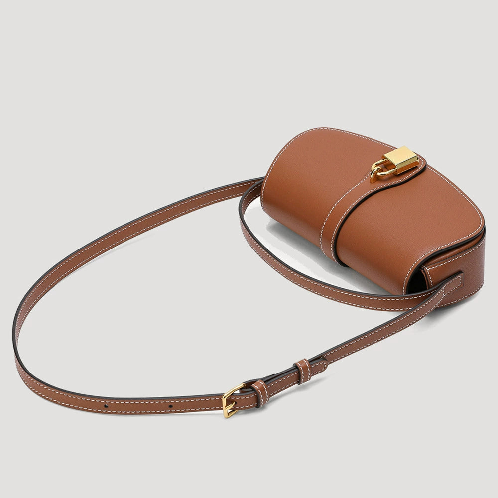 Tan Leather Saddle Bag with Gold Lock | Contrast Stitch Shoulder & Crossbody Handbag for Women