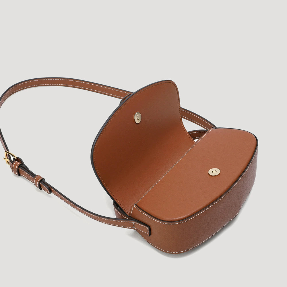 Tan Leather Saddle Bag with Gold Lock | Contrast Stitch Shoulder & Crossbody Handbag for Women